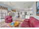 Well-lit living room with access to a patio and outdoor area at 3859 Little Country Rd, Parrish, FL 34219
