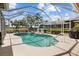 Sparkling screened-in pool area with a covered lanai and patio at 3859 Little Country Rd, Parrish, FL 34219