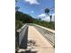 Scenic boardwalk offers beautiful vistas amidst verdant trees and greenery, creating an idyllic environment for relaxation and exploration at 3901 30Th S Ave, St Petersburg, FL 33711