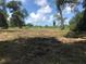 Cleared lot is ready for new construction with lush green surroundings and blue skies at 3901 30Th S Ave, St Petersburg, FL 33711