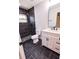 Modern bathroom featuring black and white tile shower, new toilet and modern vanity at 4501 20Th S Ave, St Petersburg, FL 33711
