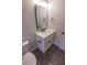 Modern bathroom featuring toilet and modern vanity with black fixtures at 4501 20Th S Ave, St Petersburg, FL 33711