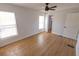 Bright bedroom with hardwood floors, multiple windows, and a walk-in closet, offering a comfortable and functional living space at 4501 20Th S Ave, St Petersburg, FL 33711