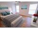 Bedroom featuring modern decorations, new windows, and attractive wood-look floors at 4501 20Th S Ave, St Petersburg, FL 33711