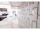 Close-up of kitchen featuring marble countertops and a stylish subway tile backsplash at 4501 20Th S Ave, St Petersburg, FL 33711