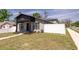 This freshly painted home has a neat yard and modern accents at 4501 20Th S Ave, St Petersburg, FL 33711