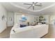 Comfortable living room with tile floors, modern decor, and a wall-mounted TV at 4607 Benito Ct, Bradenton, FL 34211