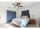 Bright bedroom featuring a modern ceiling fan and laminate wood flooring at 5001 15Th N Ave, St Petersburg, FL 33710