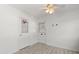Bedroom featuring a small basketball hoop, coat rack, and wood-look flooring at 5001 15Th N Ave, St Petersburg, FL 33710