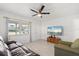 Inviting living room with large windows and laminate wood flooring at 5001 15Th N Ave, St Petersburg, FL 33710