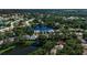 An inviting residential community with serene pond views, surrounded by mature trees and verdant landscapes at 519 Catalina Isles Cir, Venice, FL 34292