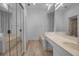 Bright bathroom with vanity, tub, and standup shower at 519 Catalina Isles Cir, Venice, FL 34292