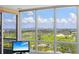 Bedroom view featuring a golf course and city skyline at 545 Sanctuary Dr # B806, Longboat Key, FL 34228