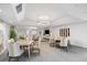 Well-lit community room with stylish seating arrangements, elegant decor, and a large television at 545 Sanctuary Dr # B806, Longboat Key, FL 34228