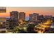 Beautiful building with an ocean view and well-lit street at sunset at 545 Sanctuary Dr # B806, Longboat Key, FL 34228