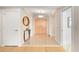 Inviting foyer with marble flooring, stylish console table, elegant lighting, and a welcoming ambiance at 545 Sanctuary Dr # B806, Longboat Key, FL 34228