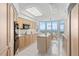 Bright kitchen features plenty of counter space, an island, and large windows with beautiful views of the ocean at 545 Sanctuary Dr # B806, Longboat Key, FL 34228
