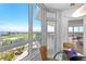 Kitchen nook features beautiful views and a small table for eating at 545 Sanctuary Dr # B806, Longboat Key, FL 34228