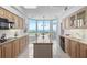 Bright kitchen features plenty of counter space, an island, and large windows with beautiful views of the ocean at 545 Sanctuary Dr # B806, Longboat Key, FL 34228