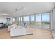 Open-concept living area, featuring a large balcony with ocean views, perfect for relaxation and entertainment at 545 Sanctuary Dr # B806, Longboat Key, FL 34228