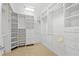 Walk-in closet has built-in organizers and drawers to help you maximize space at 545 Sanctuary Dr # B806, Longboat Key, FL 34228