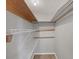 Walk-in closet with wire rack shelving and wood supports at 5602 Espanola Ave, North Port, FL 34287