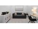 Cozy sitting room with stylish furniture and ample natural light, creating a comfortable space at 5664 Palmer Cir # 102, Bradenton, FL 34211