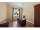 Inviting office space with a desk, chair and view of the front yard at 6390 Yellow Wood Pl, Sarasota, FL 34241