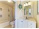 Clean bathroom featuring tile floors, a vanity with storage, and a tub with a shower at 7507 Preserves Ct # 7507, Sarasota, FL 34243