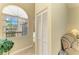 Hallway with window, natural light, and closet at 7507 Preserves Ct # 7507, Sarasota, FL 34243