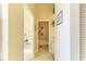 Hallway featuring a bathroom and a bedroom at 7507 Preserves Ct # 7507, Sarasota, FL 34243