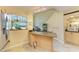 Kitchen featuring stainless steel appliances, granite countertops and breakfast bar at 7507 Preserves Ct # 7507, Sarasota, FL 34243