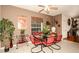 Dining area with tiled floors, lots of light and a dining table with seating for six at 7685 Plantation Cir # B, University Park, FL 34201