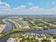 Breathtaking aerial view of a residential area, highlighting waterfront homes nestled along interconnected canals at 8058 Santa Cruz Dr, Port Charlotte, FL 33981