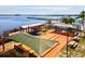 Outdoor bocce ball courts with shaded seating areas and water views create a perfect recreational space at 8058 Santa Cruz Dr, Port Charlotte, FL 33981