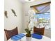 Close up of the dining area with natural lighting and view to the outdoors at 8058 Santa Cruz Dr, Port Charlotte, FL 33981