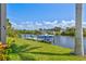Waterfront home featuring a private dock and boat with direct access to the canal at 8058 Santa Cruz Dr, Port Charlotte, FL 33981