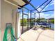 Outdoor shower on a screened lanai overlooking the canal at 8058 Santa Cruz Dr, Port Charlotte, FL 33981