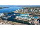 Scenic aerial view of waterfront condos and boat docks along the water at 8222 Harborside Cir, Englewood, FL 34224