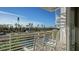 Balcony with comfortable seating and a picturesque view at 8222 Harborside Cir, Englewood, FL 34224