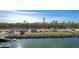 View of the community boat storage area including parking for boats, trailers and vehicles plus water views at 8222 Harborside Cir, Englewood, FL 34224