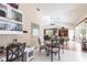 Breakfast nook with office space and a view into the living area with a pool table at 832 Carnoustie Dr, Venice, FL 34293