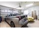 Spacious two-car garage featuring bright lighting and car access, perfect for parking and storage at 832 Carnoustie Dr, Venice, FL 34293