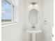 Bathroom with a pedestal sink at 8405 Golden Beach Ct, Parrish, FL 34219