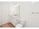 Bright bathroom featuring white cabinetry, granite counters, and modern fixtures at 8405 Golden Beach Ct, Parrish, FL 34219