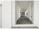 Welcoming entryway with stone floors that seamlessly guide you into the home at 8405 Golden Beach Ct, Parrish, FL 34219