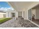 Spacious covered patio with neutral brick at 8405 Golden Beach Ct, Parrish, FL 34219