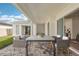 Covered patio with outdoor seating area at 8405 Golden Beach Ct, Parrish, FL 34219
