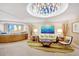 Grand lobby featuring elegant furnishings, a stunning chandelier, and welcoming ambiance for guests and visitors at 915 Seaside Dr # 606 Weeks 6-7, Sarasota, FL 34242