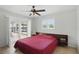 Comfortable bedroom with a sliding glass door to the lanai at 10616 Ayear Rd, Port Charlotte, FL 33981